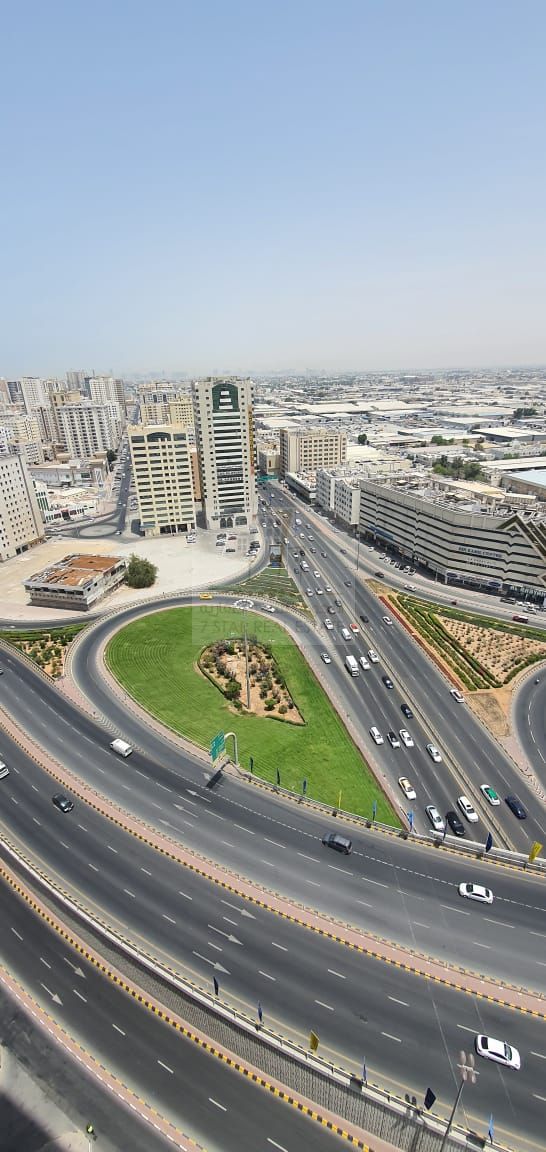 For sale Apartment with a stunning view of Al Ittihad Street and the lake in Capital Tower.